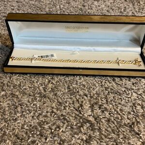 18 kt gold over sterling silver with diamond accents bracelet - never worn